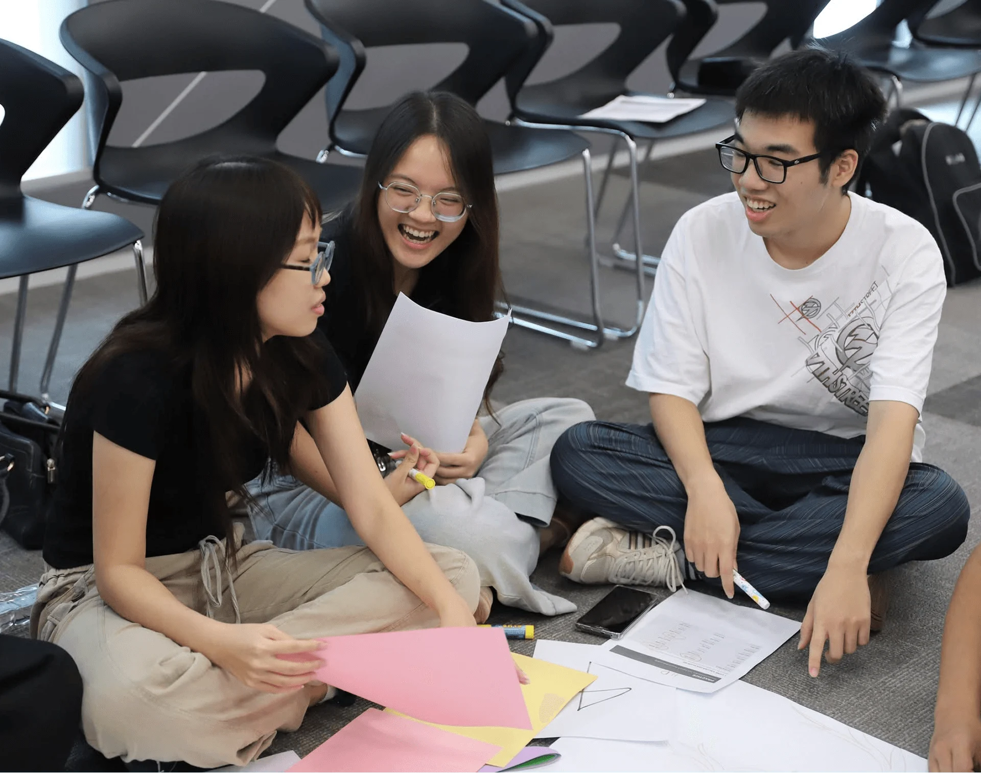 BUV students collaborating on a group project in an interactive classroom