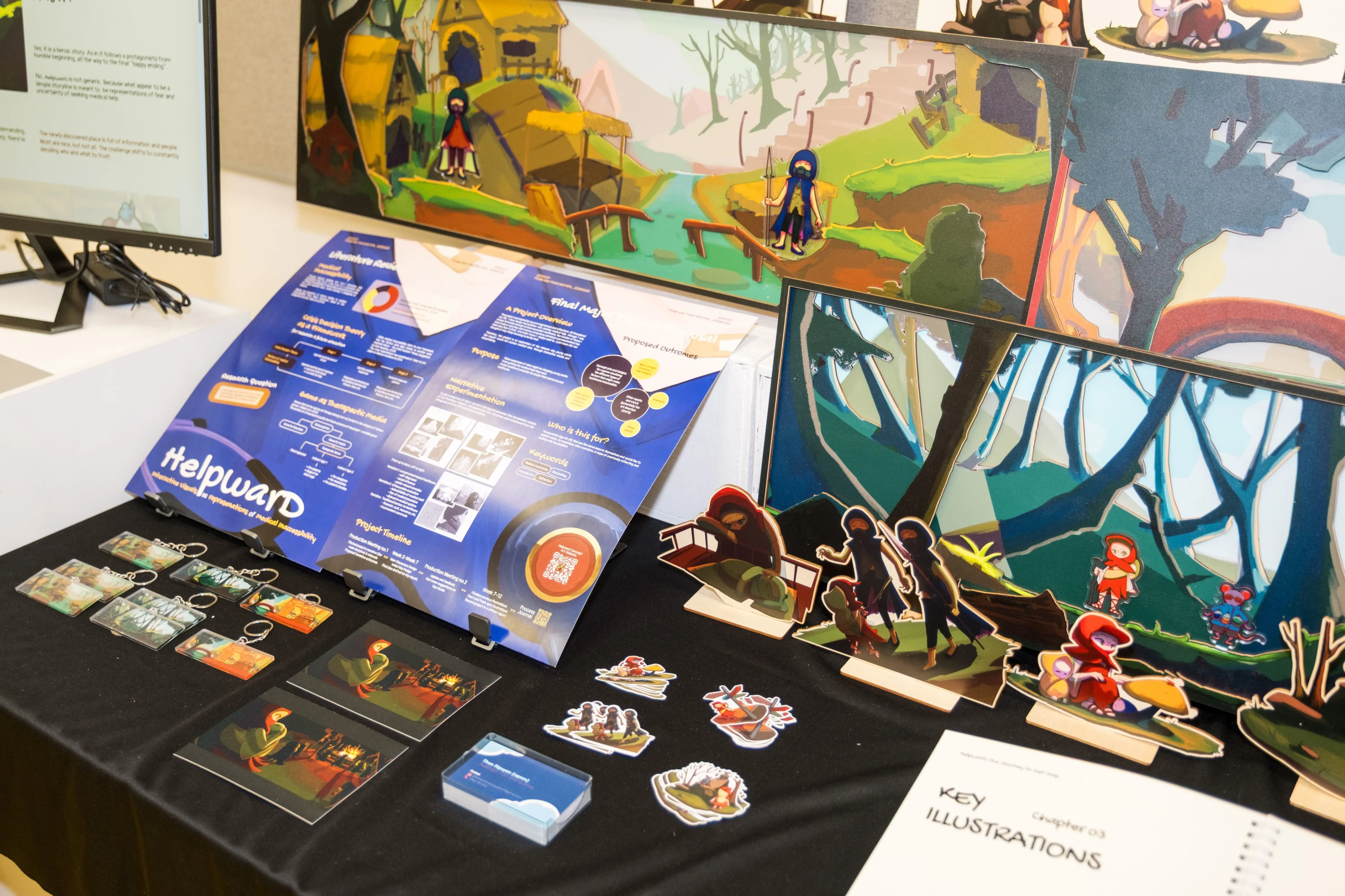 BUV student game design project Helpward with illustrated forest scenes, character cutouts and merchandise