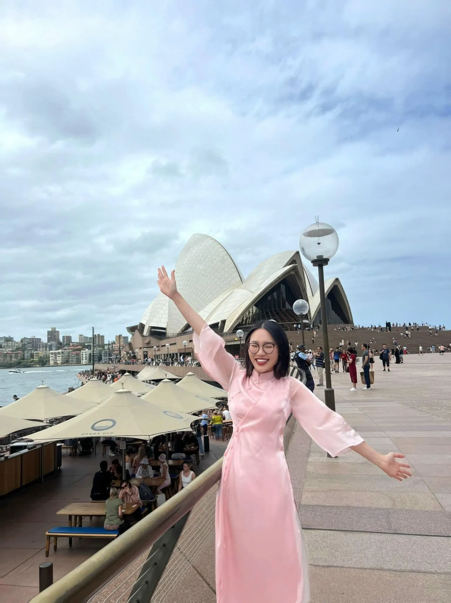 BUV student in a pink dress visiting Sydney Opera House during an international study experience