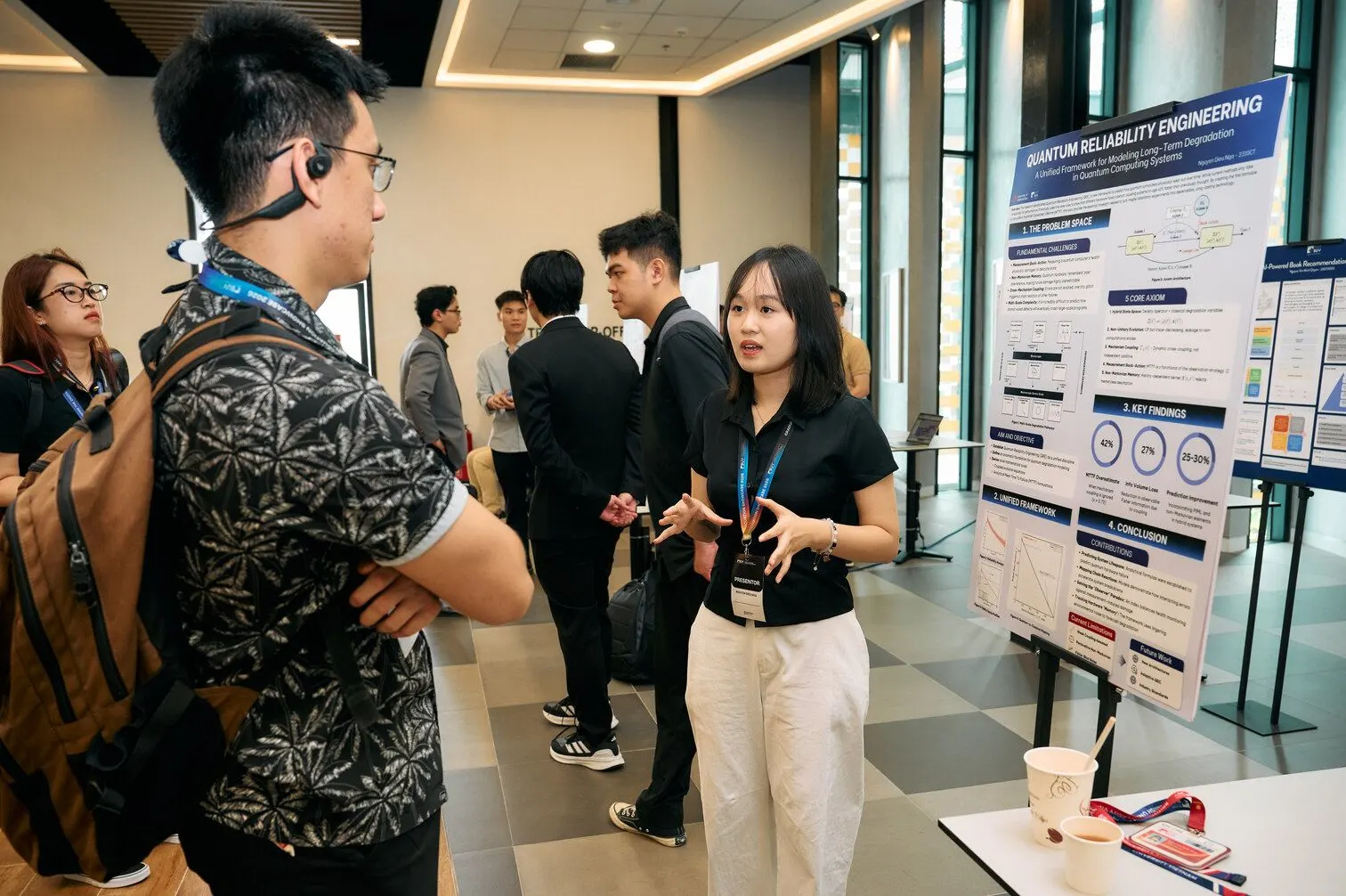 Nguyen Dieu Nga presents her research on “A Unified Hybrid Framework for Degradation Modeling in Quantum Computing Systems”