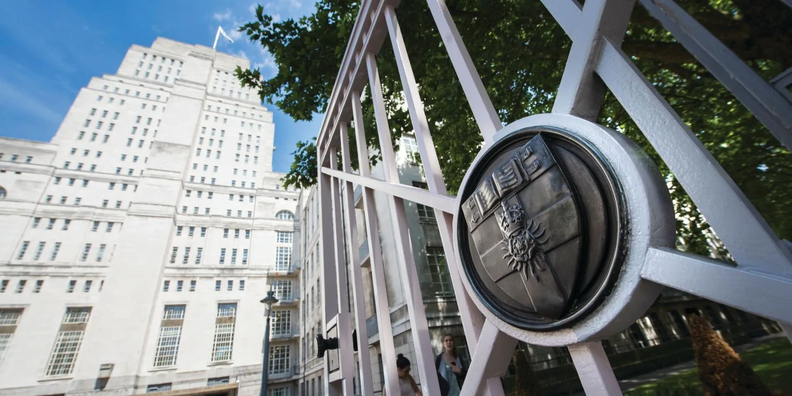 Senate House at the University of London viewed through an ornate gate in central London