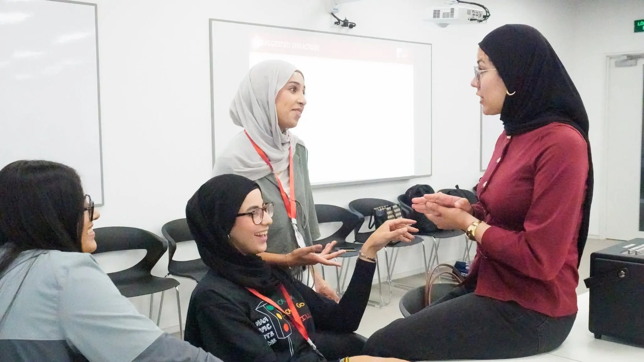 BUV students in hijabs collaborate during an interactive classroom discussion at British University Vietnam.