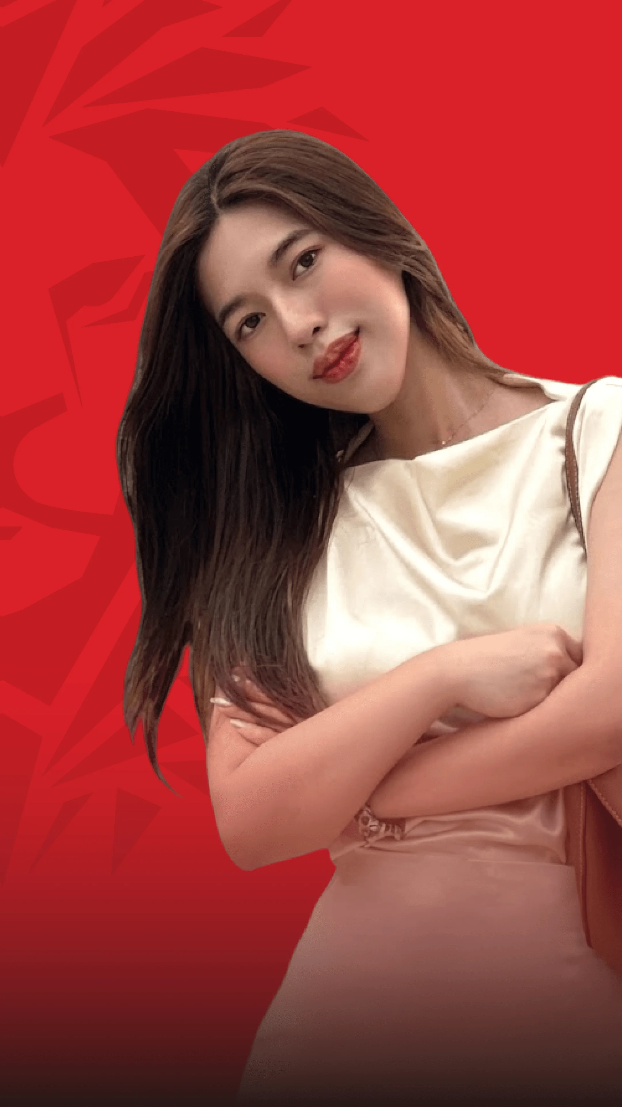BUV alumna posing in a white outfit against a red background, representing British University Vietnam alumni.