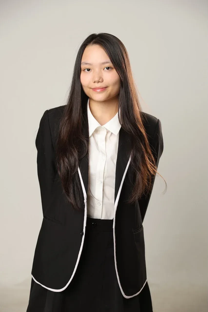 Ho Quynh Chi, BUV student and StarLeo Scholarship recipient, wearing a black blazer and white shirt
