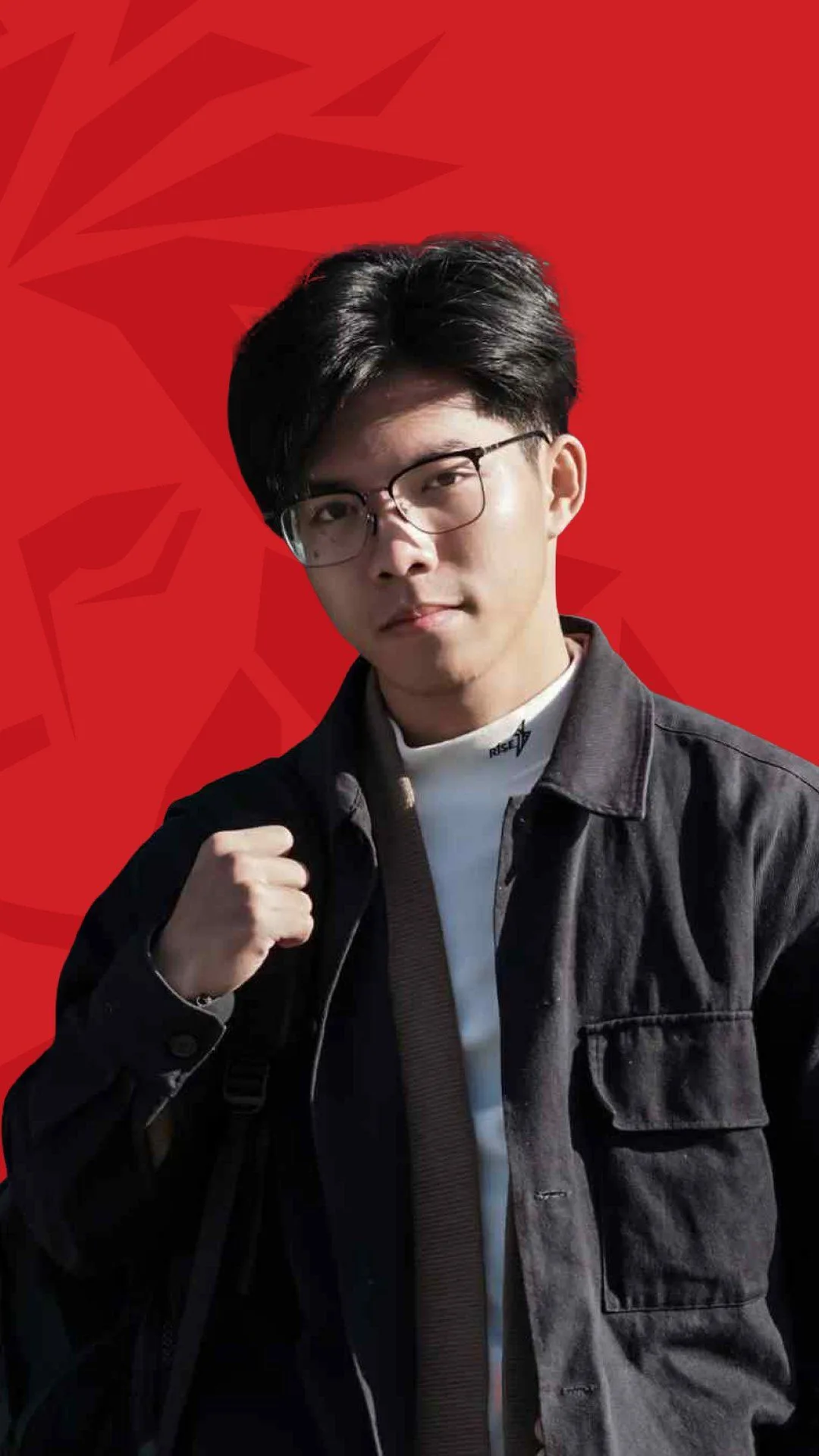 BUV alumnus Đức Anh poses with a determined expression against a red background.