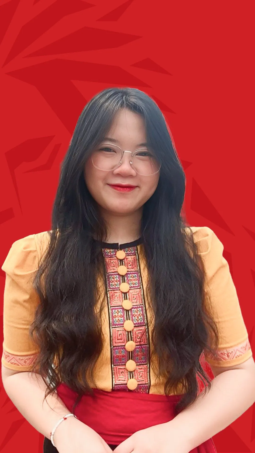 BUV alumna Quynh Anh in traditional Vietnamese attire against a red lionhearted-themed background.
