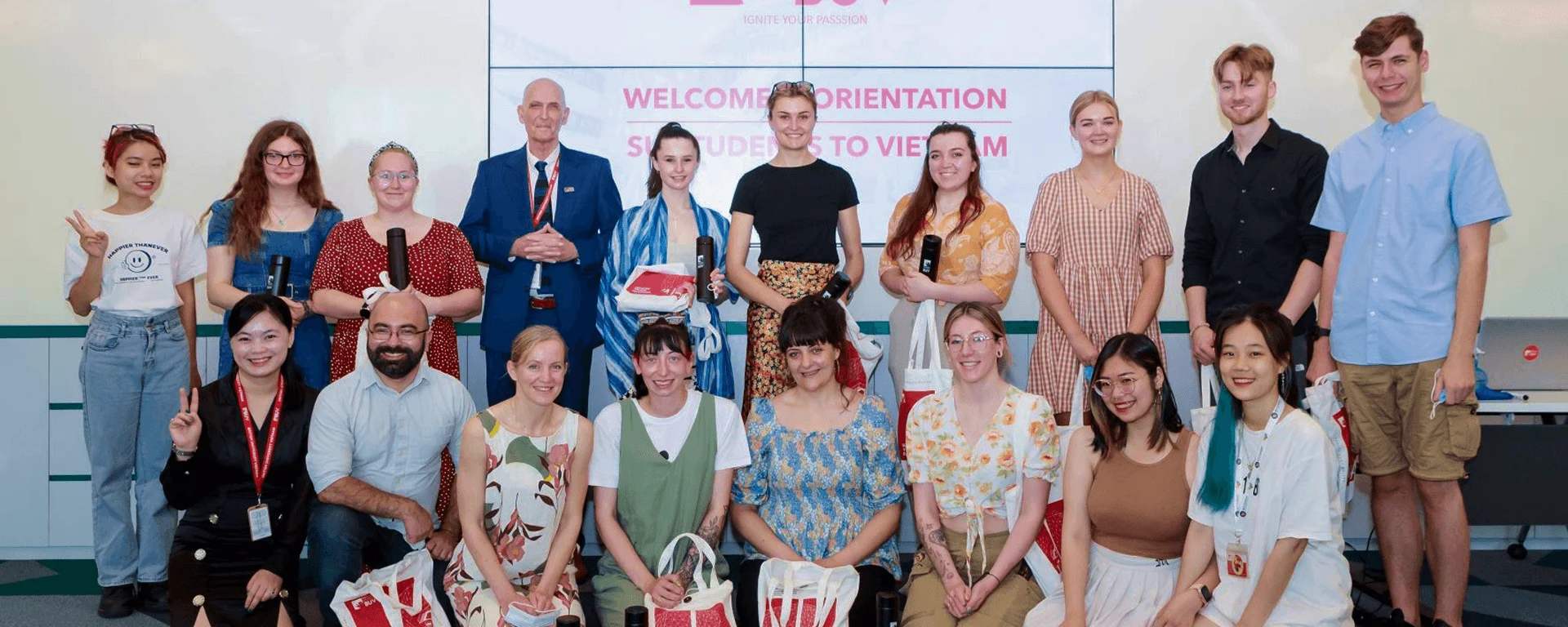 BUV orientation event welcoming international students to Vietnam with staff and students posing together
