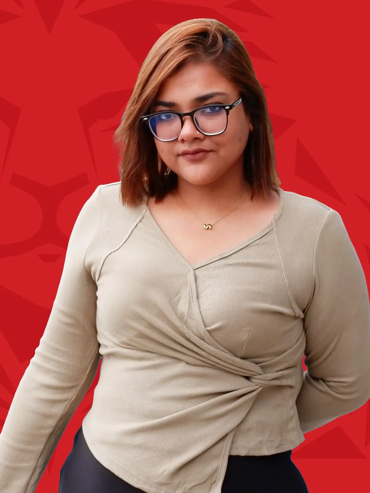Portrait of Sandra Christina Talukder wearing glasses against a red lion-themed background.